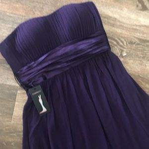 Strapless formal with tags